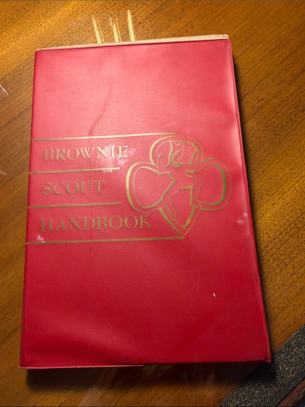 Brownie Scout Handbook - Red with Gold Emblem vinyl cover